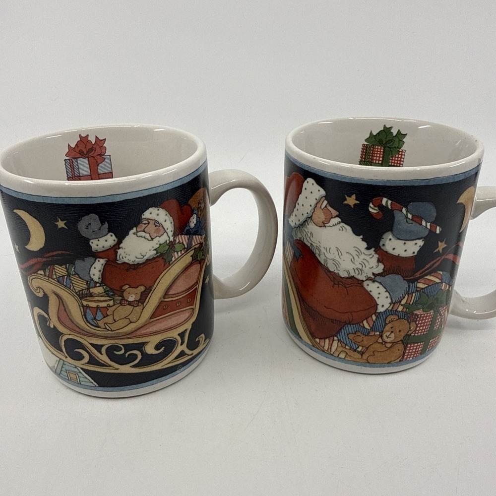 2 CIC Susan Winget Christmas Mug Santa Sleigh Toys Americana Signed Whimsical